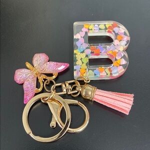 🆕 NWOT Colorful Heart Keychain with Pink Butterfly Charm